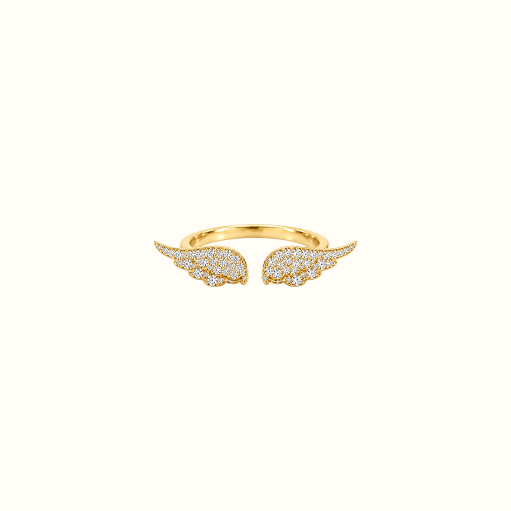 DUGO adjustable gold angel wing ring featuring sparkling CZ stones in a delicate open band design.