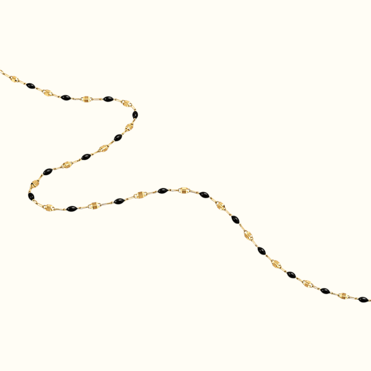 DUGO dainty enamel beaded bracelet featuring glossy black oval beads on a delicate gold chain