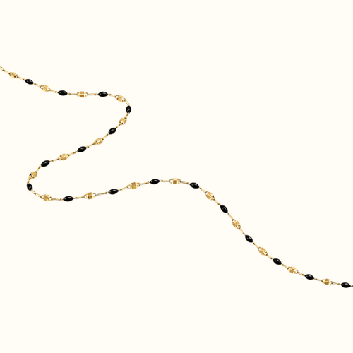 DUGO dainty enamel beaded bracelet featuring glossy black oval beads on a delicate gold chain