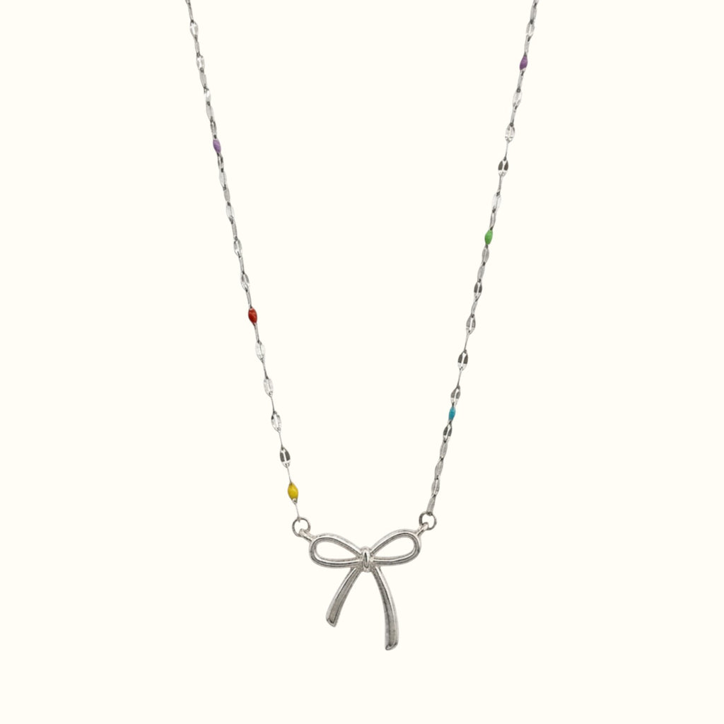 DUGO bow pendant necklace featuring a delicate chain with colorful enamel accents in 18K gold filled material.