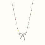 DUGO bow pendant necklace featuring a delicate chain with colorful enamel accents in 18K gold filled material.