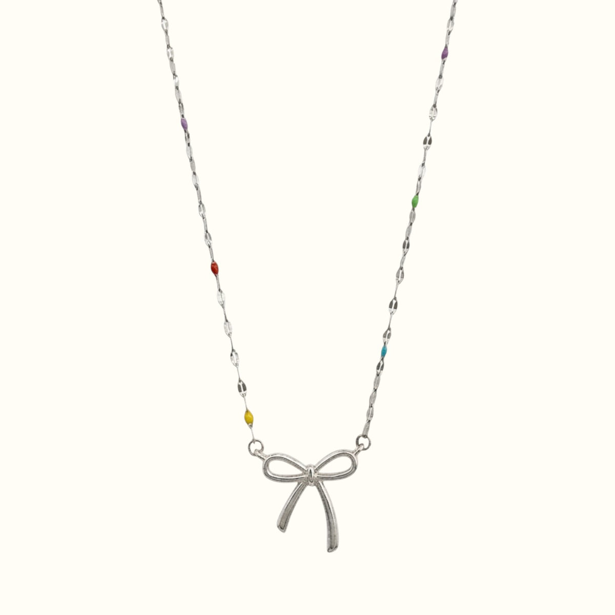 DUGO bow pendant necklace featuring a delicate chain with colorful enamel accents in 18K gold filled material.