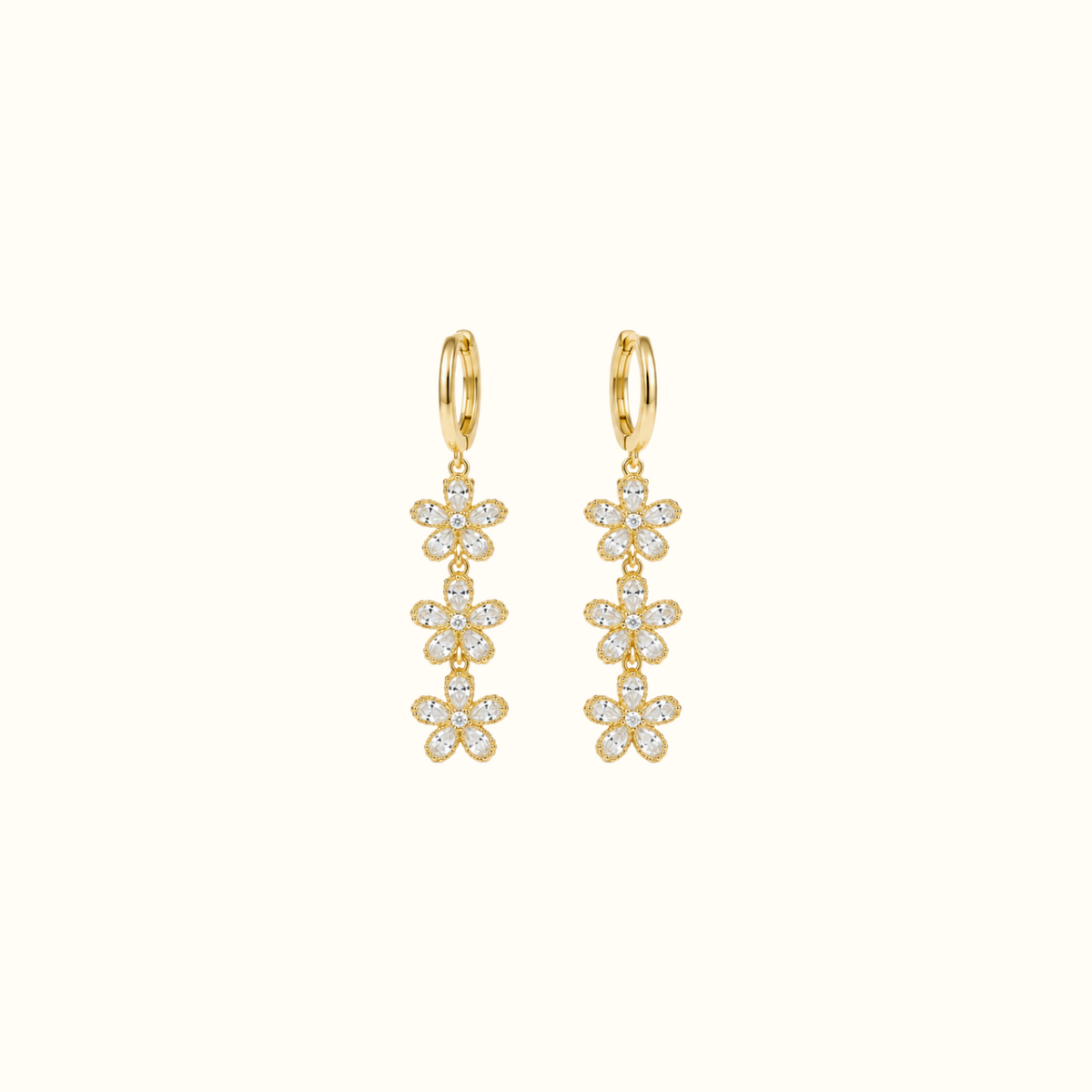 DUGO gold triple crystal flower drop earrings featuring cascading floral charms on sleek hoops for elegant style.