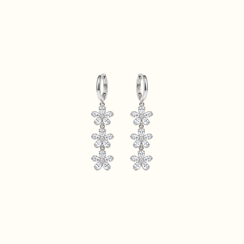 DUGO silver triple crystal flower drop earrings featuring cascading floral charms on sleek hoops.
