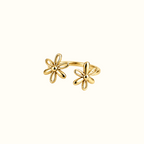 DUGO gold adjustable ring featuring two delicate daisy-inspired flowers on an open band for a feminine minimal look.