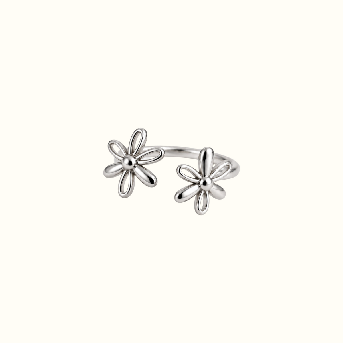 DUGO silver double flower ring with an adjustable open band featuring two delicate daisy-inspired floral motifs.