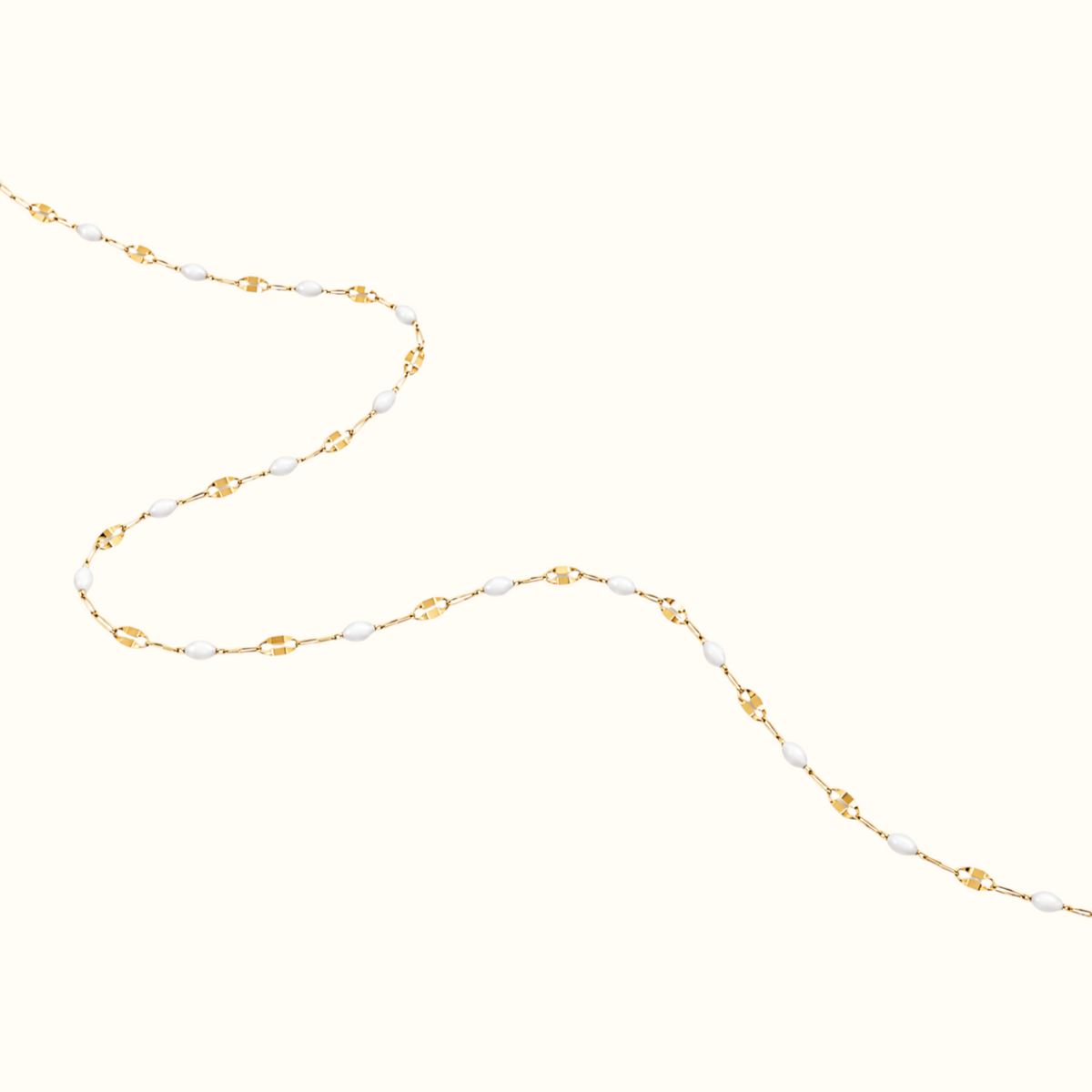 DUGO dainty enamel beaded bracelet featuring white glossy oval beads on a delicate gold chain for minimalist styling.