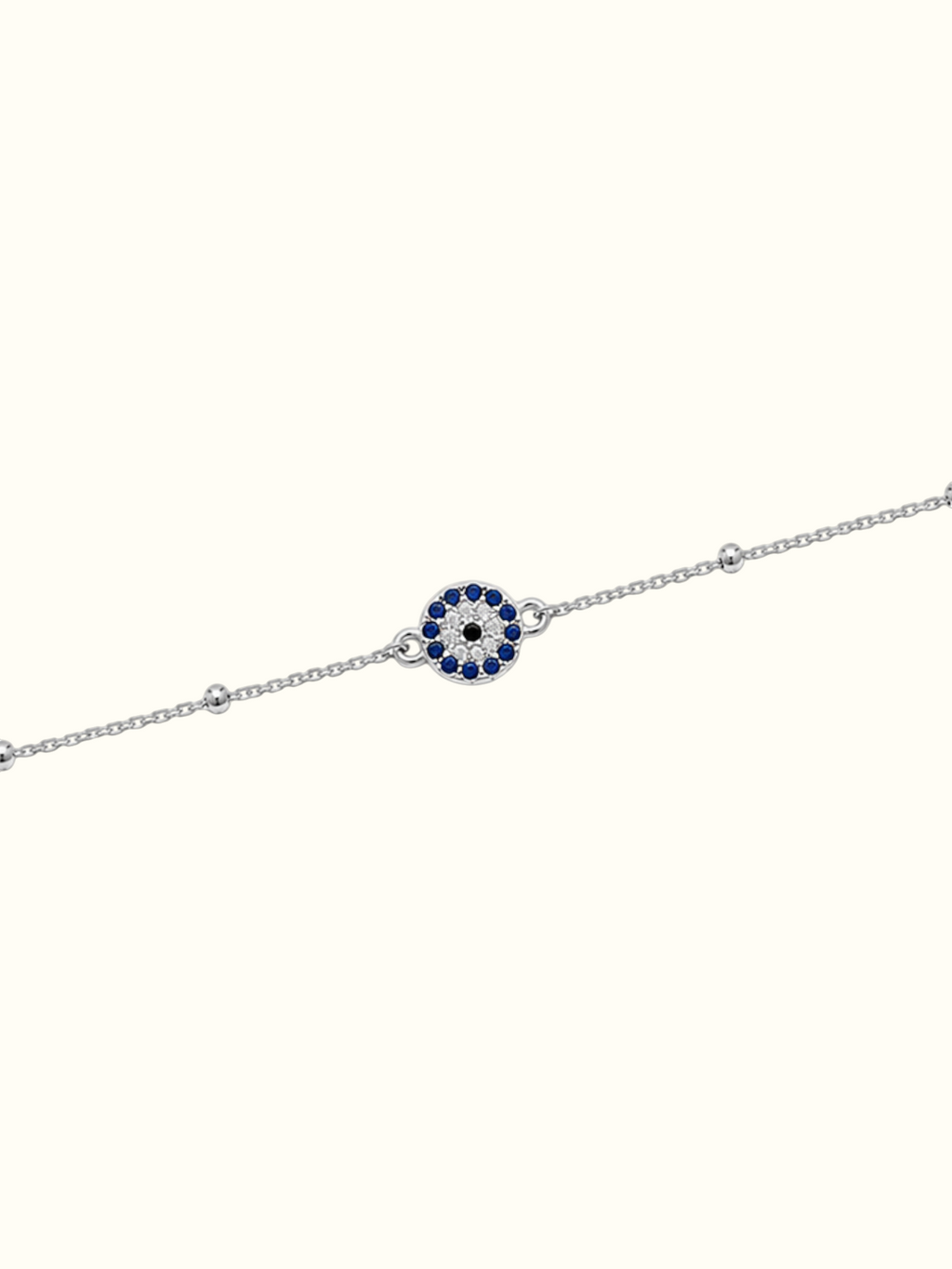 DUGO Evil Eye bracelet in silver-tone stainless steel with a blue and white crystal evil eye charm detail.