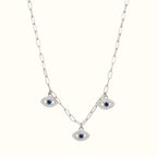 DUGO 18K gold filled paperclip chain necklace featuring three sparkling blue evil eye charms with CZ stones