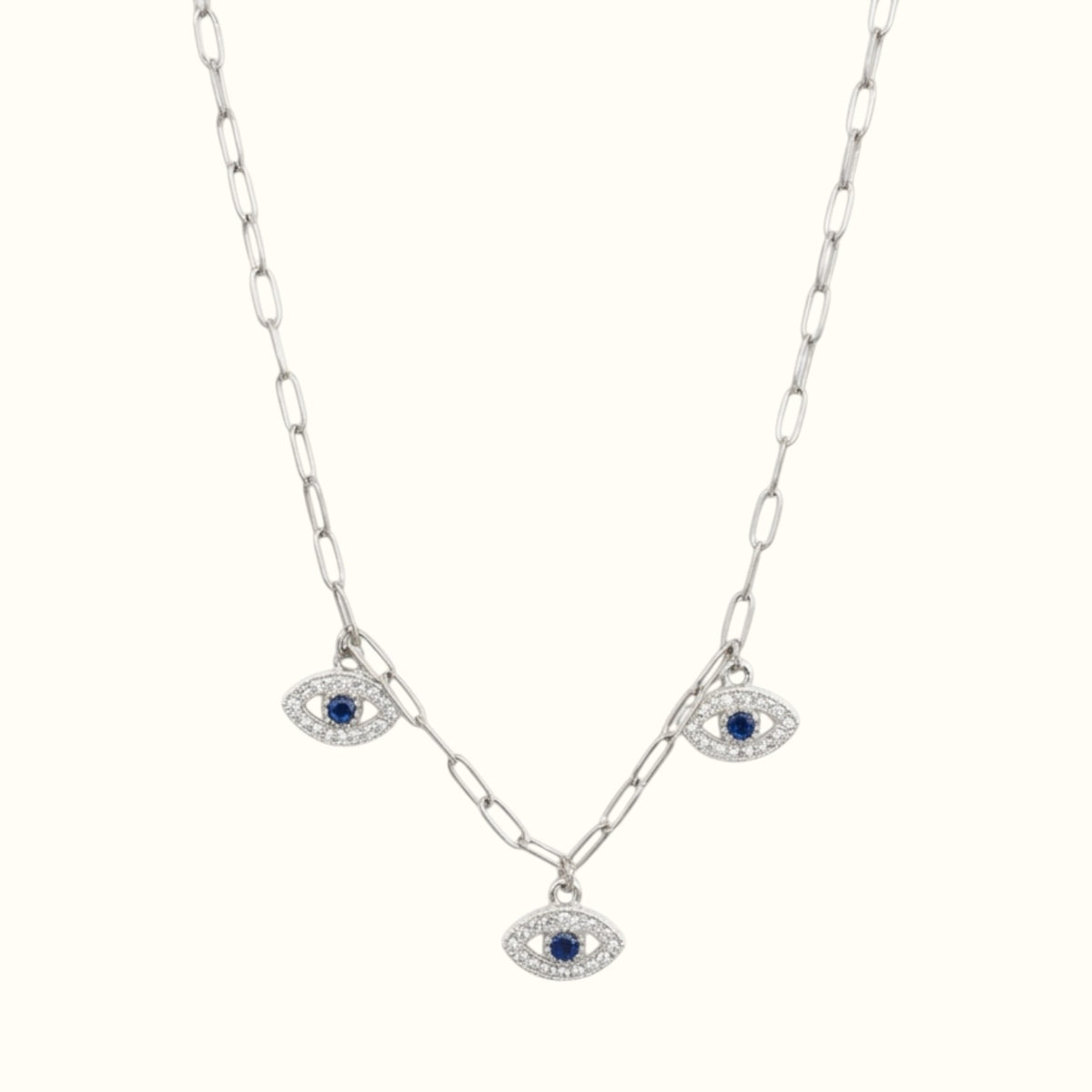 DUGO 18K gold filled paperclip chain necklace featuring three sparkling blue evil eye charms with CZ stones