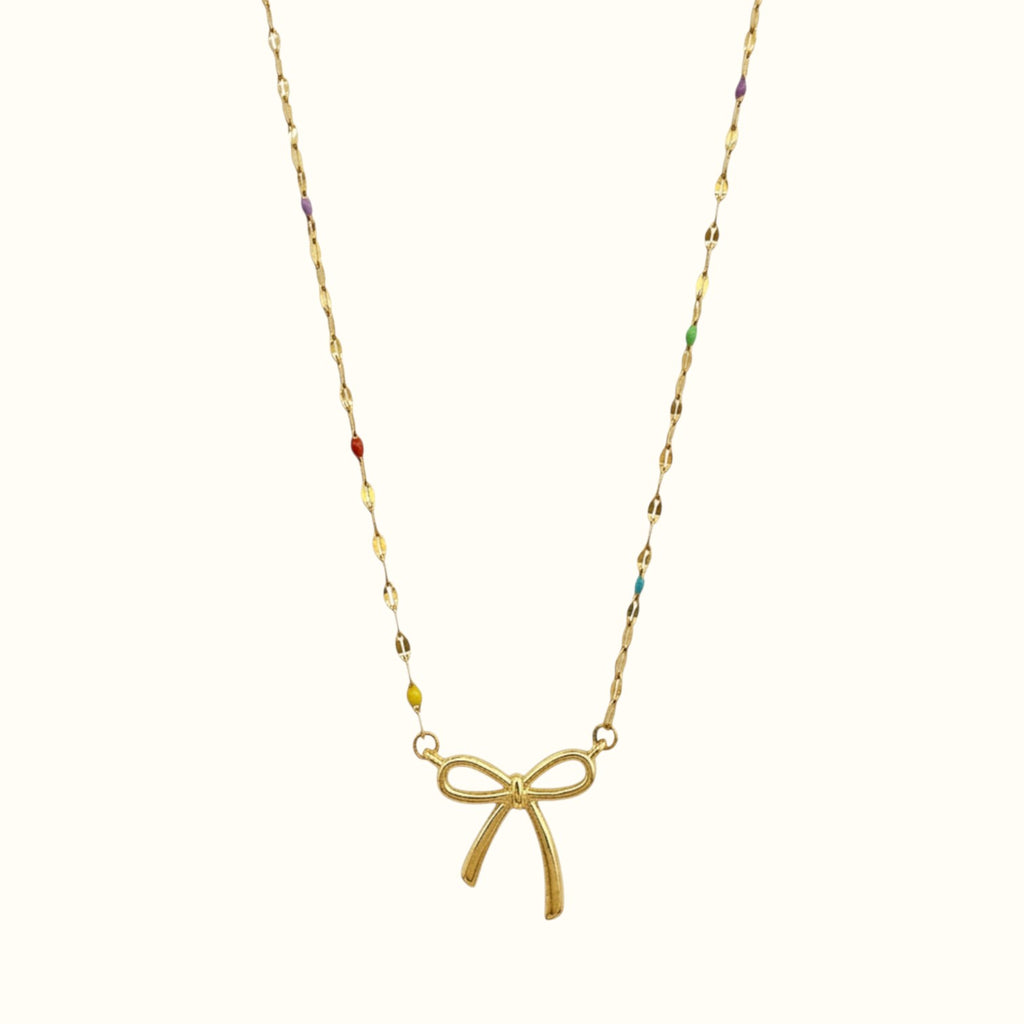 DUGO 18K gold filled necklace featuring a minimalist bow pendant and delicate chain with colorful enamel accents
