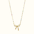 DUGO 18K gold filled necklace featuring a minimalist bow pendant and delicate chain with colorful enamel accents
