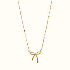 DUGO 18K gold filled necklace featuring a minimalist bow pendant and delicate chain with colorful enamel accents