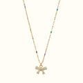 DUGO gold chain necklace featuring a mini bow pendant with sparkling zirconia stones and colorful enamel accents