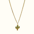 DUGO gold chain necklace featuring a small cactus pendant with green crystal accents