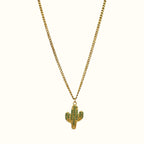 DUGO gold chain necklace featuring a small cactus pendant with green crystal accents