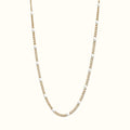 DUGO Curb Colors chain necklace in 18K gold filled stainless steel with white enamel beads on an 18-inch chain.