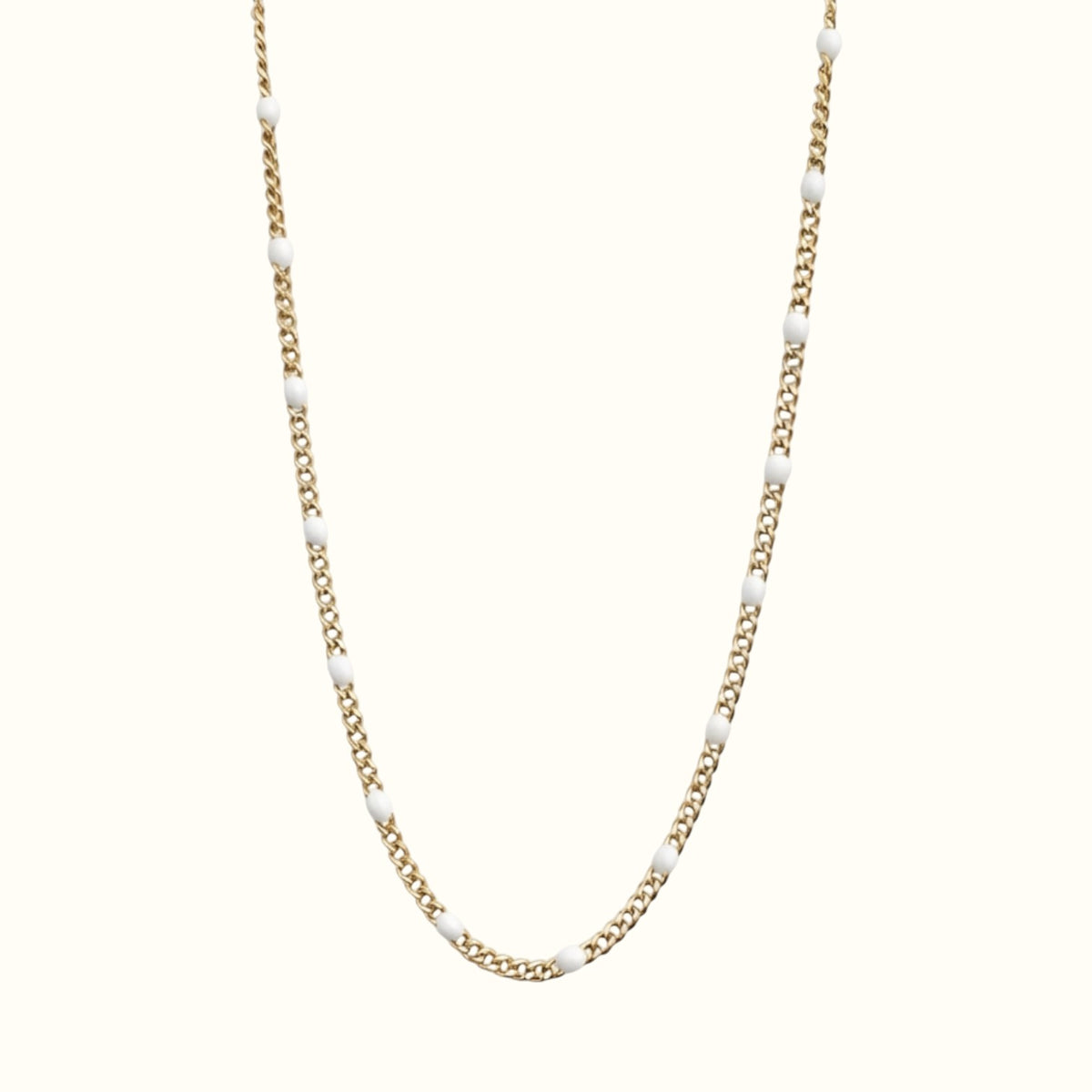 DUGO Curb Colors chain necklace in 18K gold filled stainless steel with white enamel beads on an 18-inch chain.