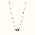DUGO 18K gold filled evil eye necklace with blue and clear cubic zirconia stones on a delicate beaded chain