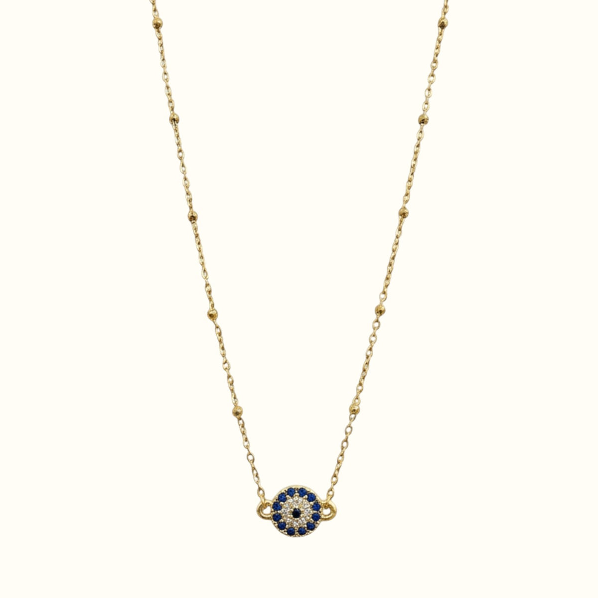 DUGO 18K gold filled evil eye necklace with blue and clear cubic zirconia stones on a delicate beaded chain