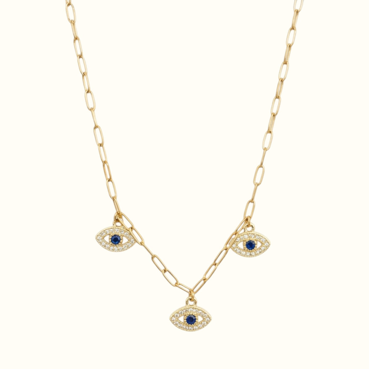 DUGO 18K gold filled paperclip chain necklace featuring three sparkling blue CZ evil eye charms for protection.