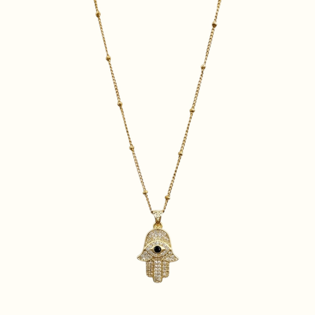 DUGO 18K gold filled Hamsa hand necklace featuring a cubic zirconia pendant with a black evil eye center