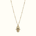 DUGO 18K gold filled Hamsa hand necklace featuring a cubic zirconia pendant with a black evil eye center
