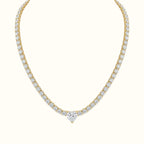 DUGO gold tennis necklace featuring a sparkling heart-shaped cubic zirconia center stone and shimmering link chain.