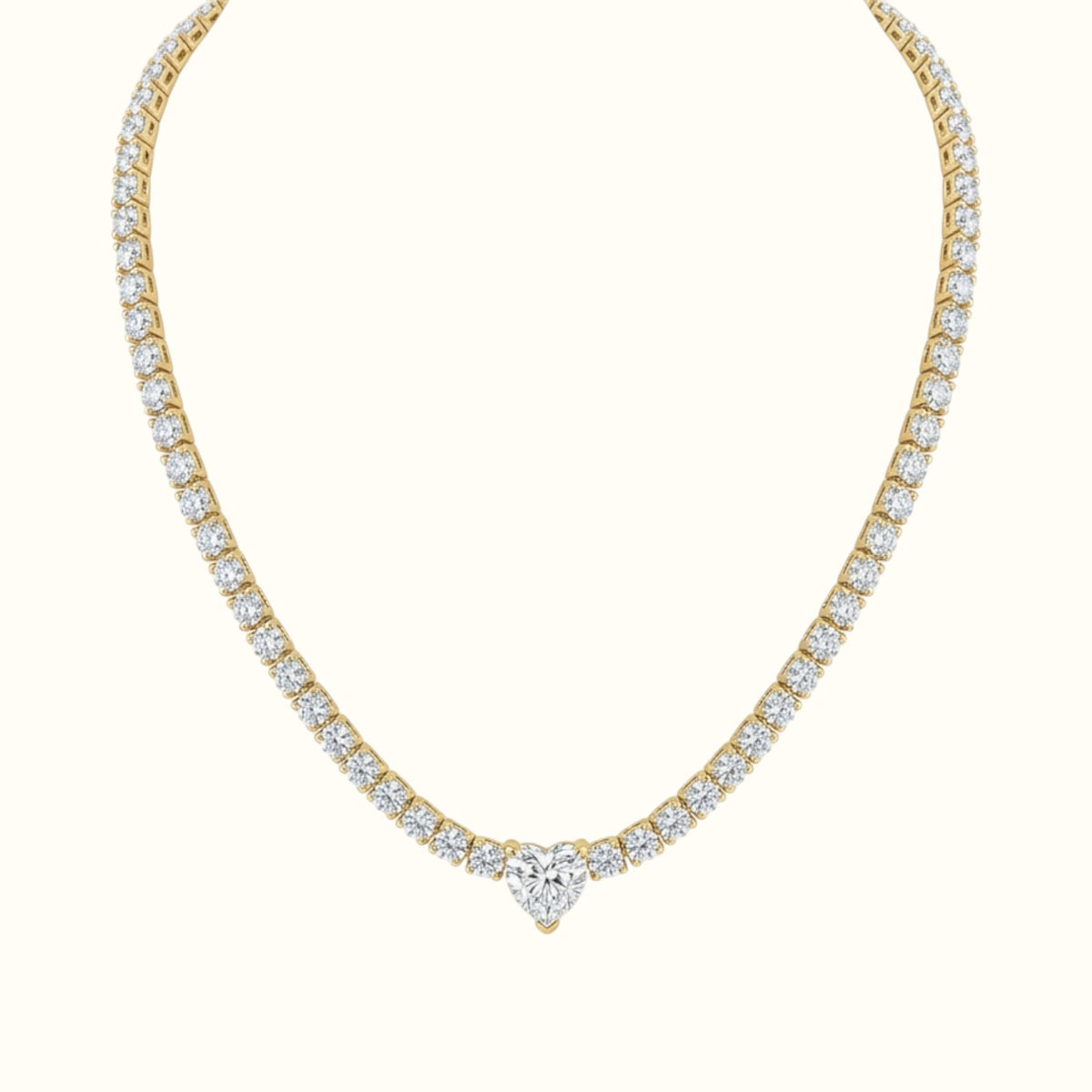 DUGO gold tennis necklace featuring a sparkling heart-shaped cubic zirconia center stone and shimmering link chain.