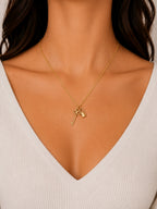 Woman wearing the DUGO gold Key and Padlock Charm Necklace