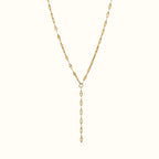 DUGO gold lariat necklace featuring a delicate textured lip chain design in a Y-drop style.