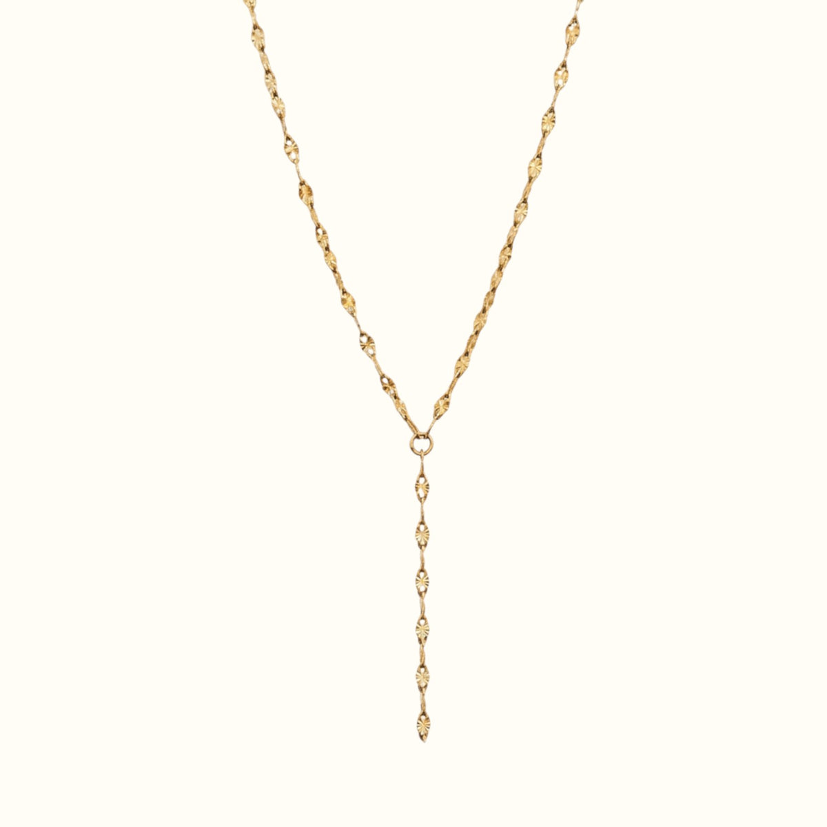 DUGO gold lariat necklace featuring a delicate textured lip chain design in a Y-drop style.