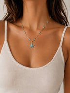 Woman wearing the DUGO gold light blue Enamel Starfish Pendant Necklace
