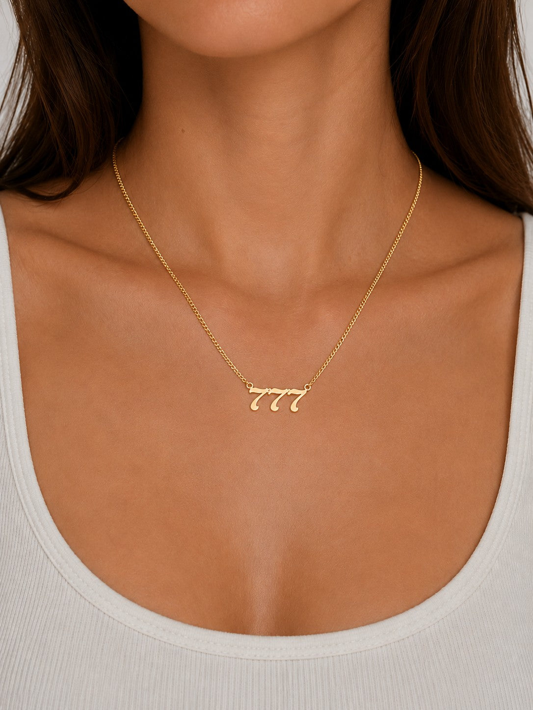 Woman wearing the DUGO gold Lucky Number Necklace