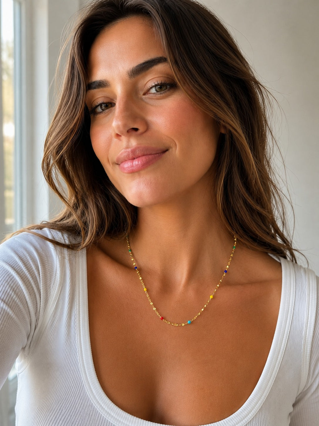 Close-up of the DUGO gold Multicolor Enamel Chain Necklace worn on the neck