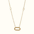 DUGO gold oval carabiner necklace featuring a delicate chain with small heart-shaped links.