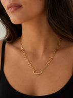 Woman wearing the DUGO gold Oval Carabiner Thick Paperclip Chain Necklace