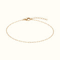 DUGO dainty 18K gold filled paperclip chain bracelet with a secure lobster clasp and adjustable extender chain.