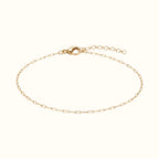 DUGO dainty 18K gold filled paperclip chain bracelet with a secure lobster clasp and adjustable extender chain.
