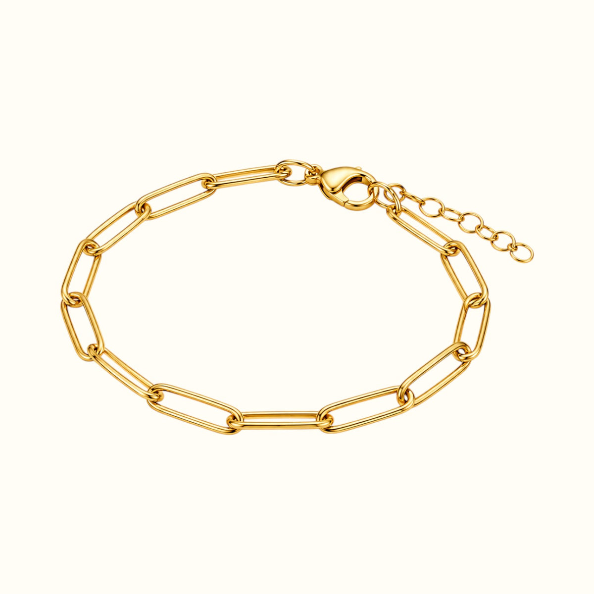 DUGO 18K gold filled paperclip chain bracelet with lobster clasp and adjustable extender on a cream background.
