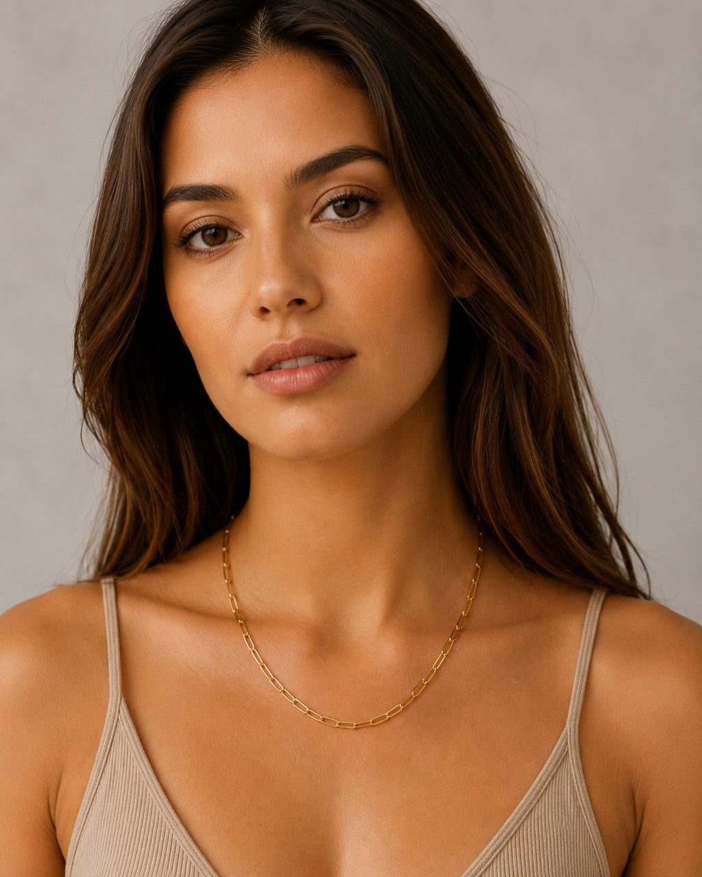 Close-up of the DUGO gold Paperclip Chain Necklace worn on the neck