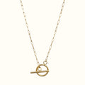 DUGO 18K gold filled paperclip chain necklace with a modern geometric toggle circle pendant on a light background.