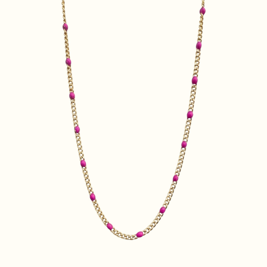 DUGO Curb Colors chain necklace featuring 18K gold-filled stainless steel links with vibrant pink enamel beads.