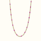 DUGO Curb Colors chain necklace featuring 18K gold-filled stainless steel links with vibrant pink enamel beads.