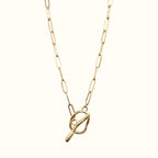 DUGO 18K gold filled paperclip chain necklace featuring a unique pretzel-shaped toggle clasp for everyday wear.