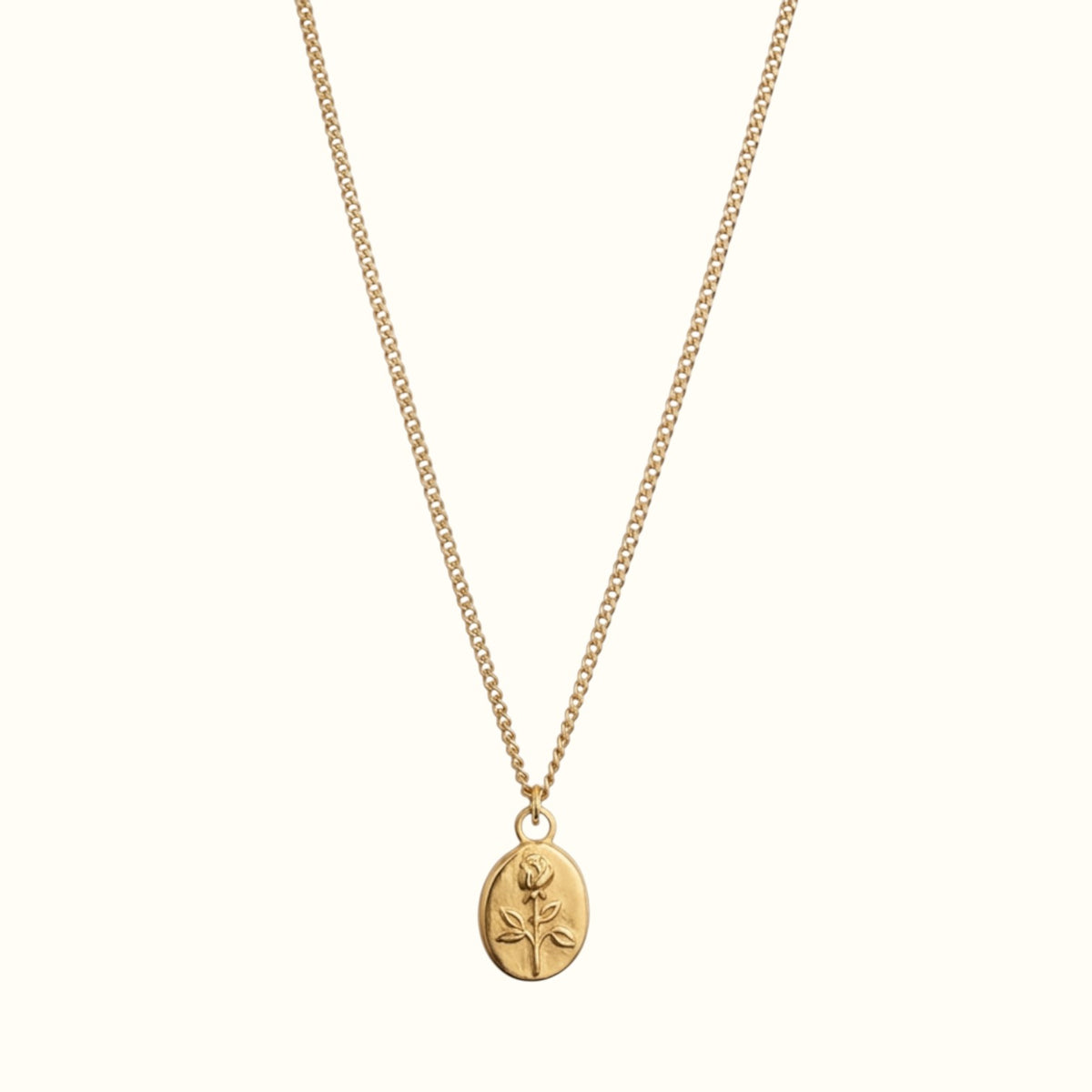 DUGO gold necklace featuring an oval pendant with an engraved rose flower design on a delicate chain