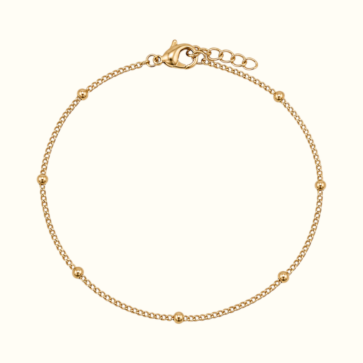 DUGO gold satellite curb chain bracelet with delicate polished beads and a lobster clasp closure.