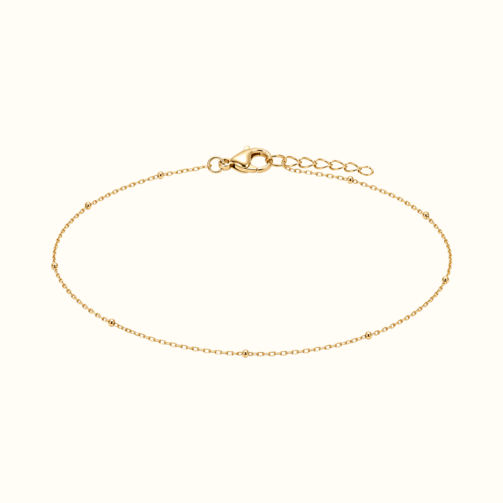 DUGO dainty gold satellite chain bracelet with delicate polished beads and a secure lobster clasp closure.