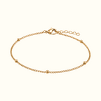 DUGO gold satellite curb chain bracelet with delicate polished beads and a secure lobster clasp closure.