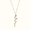 DUGO gold snake pendant necklace with cubic zirconia and ruby red stones on a delicate beaded chain